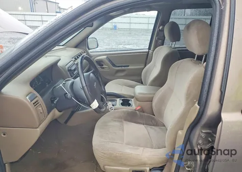 2001 Jeep Grand Cherokee Laredo из США, поврежденный, VIN 1J4GW48S71C646852